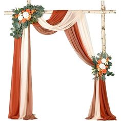 an orange and white wedding arch decorated with flowers