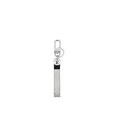 LOUIS VUITTON® - Slim Dragonne Bag Charm And Key Holder - White Louis Vuitton Pattern, Louis Vuitton Official, Key Holder, White Bag, Men's Collection, Monogram Canvas, Slime, Silver Color, Metallica