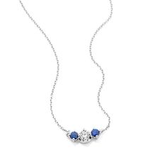 This dainty necklace offers the perfect touch of color and sparkle  whether worn alone or layered with several favorite necklaces. Crafted in bright 14-karat white gold  it features a three-stone design with a natural diamond in the center and two natural sapphire accents. An adjustable cable chain and secure lobster clasp offer worry-free wear. Three Stone Diamond, Step Kids, Fish Tanks, Sapphire Necklace, Stone Design, Natural Sapphire, Dainty Necklace, Three Stone, Cable Chain