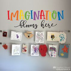 there are many magnets on the wall with words and pictures attached to it,