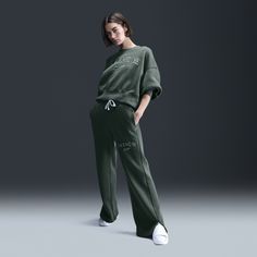 Grounded in style, comfort and versatility, meet our take on luxury loungewear. With a high-waisted fit and hem vents, these pants help keep you looking anything but basic while still feeling ultra cozy. Midweight brushed fleece holds its shape, and a wide ribbed waistband with a drawcord feels comfortably snug. Nike Sweats With Elastic Waistband For Loungewear, Oversized High-waisted Lounge Pants, Oversized High-waisted Pants For Loungewear, Nike Relaxed Fit Bottoms With Ribbed Waistband, Relaxed Fit Nike Joggers For Loungewear, Nike Relaxed Fit Leisure Activewear, Nike Joggers For Fall Loungewear, Nike Relaxed Wide Leg Bottoms, Nike Bottoms For Spring Loungewear