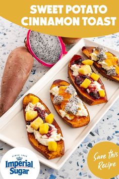 sweet potato cinnamon toast with fruit toppings on a white platter next to a glass of orange juice