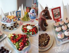 a table topped with lots of cupcakes and desserts covered in frosting