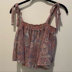 Size Small, Double Lined Chiffon Tank, Tie Sleeve Detailing, Flowy Fit, Never Worn, And Brand New Condition Spring Cotton Tops With Paisley Print, Spring Cotton Paisley Print Tops, Cotton Paisley Print Tops For Vacation, Pink Boho Print Top For Vacation, Pink Boho Print Top For Beach, Casual Paisley Print Beach Tops, Casual Paisley Print Tops For Beach, Casual Paisley Print Tops For The Beach, Paisley Print Tops For Spring And Summer