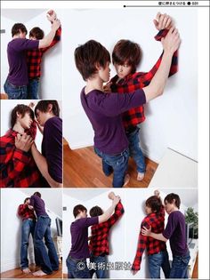 two young men are hugging each other in front of a white wall and wooden floor