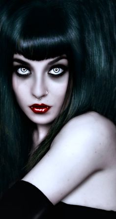 a woman with long black hair and blue eyes