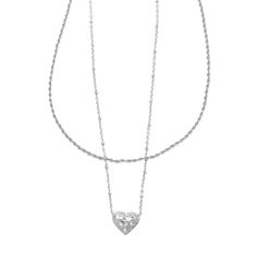 Double up on sweet styling with the Anna Filigree Multi-Strand Necklace. A classic chain paired with an adorable heart pendant, this two-in-one style takes the guesswork out of necklace layering. Designer, founder, and philanthropist Kendra Scott started her company in 2002, just three months after her first son was born. Her commitment to innovation, quality, customer service, and detail has taken her from a small startup to a billion-dollar brand. Kendra Scott is known for its design and mater Silver Heart Shaped Double Chain Jewelry, Multi Strand Necklace Gold, Brass Pendant Necklace, Small Drop Earrings, Brass Hoop Earrings, Silver Statement Earrings, Kendra Scott Earrings, Necklace Layering, Double Up