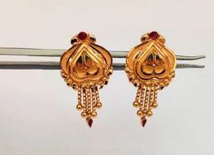 22k Gold Earring- Heart Solid Gold Stud Earrings-Real Gold Stud-Indian Gold Stud-Wedding Gift- Handmade Gold Stud by Indian kaarigari Work This is beautifully handcrafted Indian designed karigari work with deep handmade work with little Gemstone that gives it very elegant and eye catchy look! PRODUCT SPECIFICATIONS:  Material : 22k Solid Yellow Gold Weight: 4.060 gram approx    We accept custom orders and design as well! Customer satisfaction is our utmost priority,  Feel free to have any query, Gold Earrings With Intricate Design For Wedding, Traditional Earrings With Intricate Design For Marriage, Gold Temple Jewelry Earrings For Marriage, Festive Intricate Design Earrings For Wedding, Festival Bridal Earrings With Latkans, Festive Wedding Earrings With Intricate Design, Festive Anniversary Bridal Earrings With Latkans, Gold Chandbali Earrings For Marriage, Gold Chandbali Earrings For Wedding