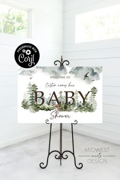 a welcome sign with the words baby shower written on it and an image of trees