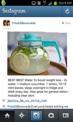 a teapot filled with water and lemon slices