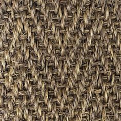 close up view of woven fabric textured in brown and beige colors, as seen from above