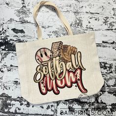 "Softball Mom Canvas Tote. Softball Mom Bag. Game Day Linen Tote Bag. 15\" x 15\" with 5\" depth. 100% Polyester This tote is made with sublimaiton. Wr print all of our items in our shop in Oak Ridge, Tennessee and ship directly to you. Processing time is up to 10 business days. All items are made to order." Customizable White Bags For Sports Events, White Tote Bags For Sports Events, White Tote Bag For Sports Events, Softball Mom Bag, Mom Bags, Softball Mom, Softball, Canvas Tote, Purses And Handbags