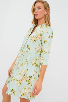 This beautifully printed silhouette is made for your closet! The Aqua Watercolor Royal Shirt Dress is amazingly lightweight and a perfect transition piece that is easy to accessorize. Featuring a round neckline, three-quarter sleeves, and a front button placket, this mini is flattering and flirty. Style with sandals and a tote for strolling around town, or with espadrilles and gold jewelry for an elevated dinner look. Round neckline Three-quarter length sleeves Concealed button down front placke 3/4 Sleeve Shirt Dress For The Beach, Casual Dresses With Roll-up 3/4 Sleeves, Casual Dresses With 3/4 Roll-up Sleeves, Casual Dress With Roll-up 3/4 Sleeves, Casual Dress With 3/4 Roll-up Sleeves, Spring V-neck Printed Shirt Dress, Casual Printed Shirt Dress, Summer Half Sleeve Shirt Dress, Casual Floral Print Dress With 3/4 Sleeves