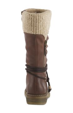 Faux-shearling lining enhances the cozy comfort of a stylish and practical boot embellished with a knit cuff and decorative wraparound laces. 1 3/4" heel 10 1/4" shaft; 14" calf circumference Water-resistant Cushioned footbed Flexible sole Synthetic upper/textile faux-fur lining/rubber sole Imported Shearling Boots Woman, Adjustable Shoes, Spring Boots, Spring Step Shoes, Shearling Boots, Pull On Boots, Leather Pulls, Comforters Cozy, Knit Cuff