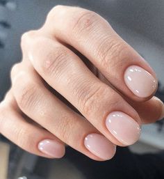 a woman's hand with french manies on it