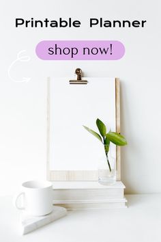 a clipboard with a plant in it and the words printable planner shop now