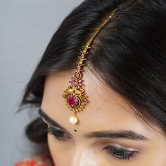 Elevate your bridal ensemble with the LOVENSPIRE Rhinestone Maang Tikka, a stunning piece of Indian bridal jewelry. Crafted with exquisite detail, this head accessory features intricate Kundan work and shimmering rhinestones, blending modern sophistication with timeless charm. Add a touch of elegance and allure to your wedding look. Each package contains 1 piece of mang tikka MATERIAL - Alloy Metal with Kundan and Pearl DIMENSIONS - 4 Inches Length, 1 Inch Wide IDEAL FOR - Whether it is Diwali, Mang Tikka Gold Bridal, Rajasthani Mangtika, Maang Tikka Bridal, Forehead Jewelry, Maang Tika, Mang Tikka, Matha Patti, Kundan Work, Jewelry Pakistani