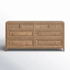 an image of a wooden dresser with drawers