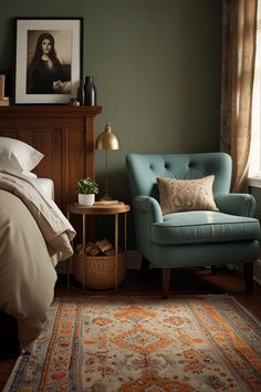 a bedroom with green walls and a blue chair next to a bed in front of a window