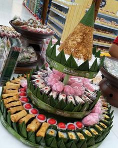 a display in a store filled with lots of different types of food and desserts