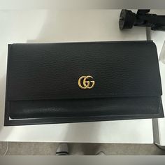 Pre Owned It's In Excellent Condition, No Scratches Bought It On Fashionpille Brand New Authentic Gucci Bifold Evening Wallet, Gucci Black Wallet For Formal Occasion, Black Gucci Wallet For Evening, Elegant Gucci Bifold Wallet, Gucci Black Formal Wallet, Elegant Gucci Bifold Bag, Classic Gucci Wallet For Evening, Luxury Gucci Wallet For Evening, Designer Gucci Evening Wallets