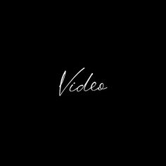 the word video written in cursive writing on a black background with white ink