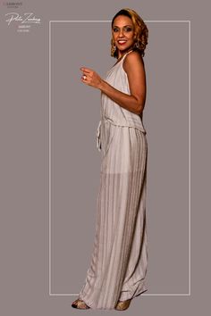 A beautiful, elegant, and ultra chic Palazzo pantsuit in a handwoven cream linen and cotton mix. Our slogan, "Anytime, Anywhere," is a perfect fit for this stunning pantsuit, a true Zambony classic. The pants fit most sizes due to the drawstring waist. Waist: 44" Length: 45" Top size: Medium Fabric care: hand wash in warm water and hang to dry gently. Woolite Extra Delicate is the preferred detergent. Use a cool iron if needed. Chic Beige Linen Jumpsuits And Rompers, Elegant Linen Jumpsuits And Rompers For Beach, Elegant Beige Jumpsuits And Rompers For Loungewear, Elegant Beige Summer Pantsuit, Chic Beige Pantsuit For Summer, Pants Fit, Cream Colour, Elegant Casual, Elegant Chic