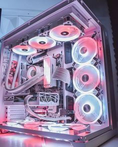 the inside of a computer case with red and white lights