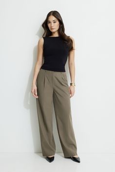 Let me introduce you to Sofia - The relaxed pleated straight leg pant. Features - Hook and zipper fly - Side pockets, faux back pockets - Pleated detail Size & Fit - Relaxed fit - Straight leg - Ultra-high waist: 12.5" - Inseam: 31" Materials & Care - 62% Polyester, 27% Rayon, 7% Wool, 4% Spandex - Machine wash, cold - Imported Taupe Pants, Customer Service Gifts, Brown Trousers, Straight Leg Pant, Pants Brown, Outfits For Work, Fall Clothes, Straight Leg Pants, How To Introduce Yourself