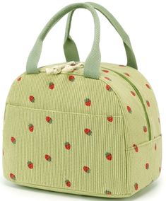 a green lunch bag with red apples on the front and side zippered closures