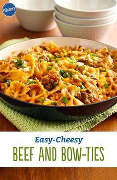 easy cheesy beef and bow - ties casserole is on the table