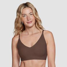 The True & Co. True Everybody Adjustable-Strap Triangle Bra provides a soft, comfortable fit and seamless look that you'll want to wear every day. Available in several solid colors, this pull-on bra comes in a plunging V-neck design that works great with button-downs, tees, tanks and more. Adjustable shoulder straps let you customize the fit to suit your shape and style, while lightly lined cups provide soft comfort and a smooth finish under whatever stylish outfit you're putting together. Our bras are made for the bodies we live in: soft, stretchy, supportive, pretty, confidence-boosting, and above all, designed and made for comfort, that will be smooth against your body and lay flat under clothes. With a wireless, clasp-free design, it just may be the most comfortable bra you’ll own. V-neck Stretch Bra With Soft Touch, Stretch V-neck Bra, Solid Color V-neck Sports Bra With Medium Support, Solid Stretch V-neck Bra, V-neck Sports Bra With Built-in Support, Comfortable Bra, Most Comfortable Bra, Bra Measurements, Triangle Bra