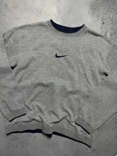 Vintage Crewneck Nike boxy center swoosh y2k fits logo USA 🇺🇸 Size Men's / US XL / EU 56 / 4 Color Grey Condition Gently Used Nike Vintage central logo central swoosh crewneck 80s 90s 00s retro spellout y2k sweatshirt centre swoosh big logo. The material is pleasant to the body. In a good condition. Fast sending! Condition : 8,8/10 Chest - 65 cm Length - 66 cm Shoulders - 59 cm Sleeve Length - 63 cm - ALL ITEMS ARE HEAT TREATED AND WASHED BEFORE SHIPPING - FOLLOW MY STORE - SEE MY OTHER ITEMS Mens Vintage Nike Sweatshirt, Nike Vintage Sweatshirt, Logo Usa, Central Logo, Y2k Sweatshirt, Old Sweatshirt, Y2k Fits, Vintage Nike Sweatshirt, Boys Fits