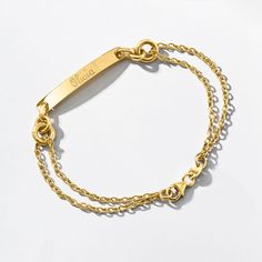 Ross-Simons - Name - Italian 14kt Yellow Gold ID Bracelet. 7". A little simplicity for your stack! From Italy, this 14kt yellow gold ID bracelet features a glossy bar centered on two chic cable chains. FREE engraving of a name with up to 10 characters in your choice of block or script type. Lobster clasp, 14kt yellow gold personalized ID bracelet. Adjustable Yellow Gold Dainty Name Bracelet, Adjustable Dainty Yellow Gold Name Bracelet, Dainty Adjustable Yellow Gold Name Bracelet, Classic Yellow Gold Nameplate Bracelet, Classic Yellow Gold Sterling Silver Bracelets, Classic Adjustable 14k Gold Name Bracelet, Dainty 14k Yellow Gold Name Bracelet, Personalized Classic Yellow Gold Bracelet, Classic 14k Gold Personalized Chain Bracelet