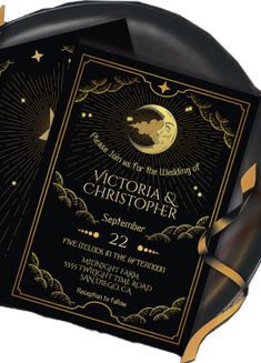 a black and gold wedding card with an image of the moon in the sky on it