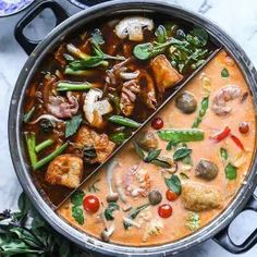 a pan filled with meat and vegetables on top of a stove