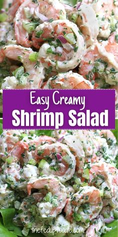 shrimp salad with cream cheese and herbs in it on a green leafy platter