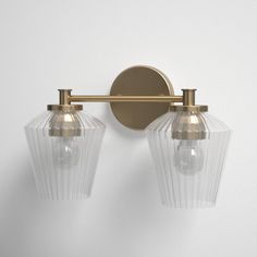 two lights that are on the side of a wall