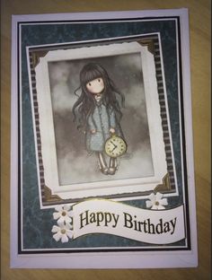 a birthday card with a girl holding a clock