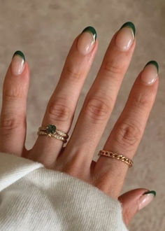 st. patrick's day nails: dark green and gold glitter French tips St Patrick Day Manicure, Subtle At Patrick’s Nails, March Nail Inspo Short, White And Green St Patricks Day Nails, Cute Nails For Fair, Nude St Patricks Day Nails, Classy Saint Patricks Day Nails, Saint Pattys Nails