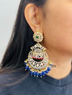 Blue Statement Kundan Cz Premium Double jhumka Earrings. Expertly crafted with premium materials, the Blue Statement Kundan Cz Earrings are a stunning addition to any jewelry collection. Featuring a striking double jhumka design, these earrings showcase intricate Kundan and Cz stones for a luxurious look. Elevate your style with these elegant earrings and make a statement wherever you go.  . Kundan Jhumkas, Jhumka Design, Earrings Kundan, Jhumka Designs, Types Of Earrings, Earrings Indian, Kundan Earrings, Women Earrings, Indian Earrings