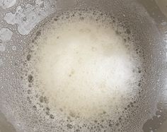 water is boiling in a glass bowl on the table