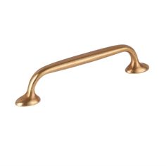 an antique brass pull handle on a white background