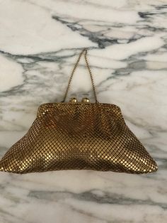 Just like Whiting and Davis but no signature this adorable Little mesh bag has Lucite closure probably from the 1950s or 60s. Has a pocket and a chain handle. Please look at photos for measurements, great for lipstick compact and a couple of other small items in very good condition.  I believe it is american made and is same quality as the Whiting and Davis purse.   As always, local pickup is available. Aphrodite's Antique & Gifts 11 Milton Ave, Highland, NY 12528 845-255-2769 Vintage Handheld Bag For Party, Vintage Satchel Evening Bag For Parties, Vintage Satchel Shoulder Bag For Party, Vintage Pouch Bag For Party, Retro Evening Pouch Bag, Retro Rectangular Coin Purse For Evening, Retro Pouch Bag For Party, Retro Clutch Bag For Vintage Events, Vintage Formal Rectangular Pouch