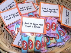 a basket filled with lots of candy sitting on top of a table next to each other