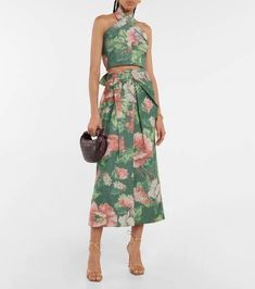 Elevate your spring wardrobe edit with the Luna floral top from Erdem. Designed with a graceful halterneck silhouette, it has a cropped length and ties at the back..Closure: self-ties.Lining: 100% cotton, partially lined.Made in the UK.Designer color name: Green /Red.Material: 28% cotton, 36% polyester, 36% linen.Care instructions: dry clean.Fits large to size - we recommend trying one size smaller.Low back.Adjustable at the waist.Lightweight material.Cropped.The model seen in the picture is 178 Clean Fits, Halterneck Top, Wardrobe Edit, Halter Neck Top, Spring Wardrobe, Floral Top, Low Back, Floral Tops, Color Design