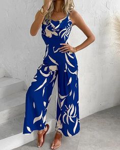 Step into summer with this elegant and versatile Spaghetti Strap Wide Leg Jumpsuit! Crafted for both style and comfort, this fashion-forward piece features a high waist and flowing wide legs. The lightweight fabric keeps you cool during warm days, while the adjustable spaghetti straps add a touch of femininity. Whether you're strolling on the beach or attending a garden party, this jumpsuit effortlessly combines casual and chic. Jumpsuits Womens Fashion, Women Vacation, Backless Jumpsuit, Fitted Jumpsuit, Chic Type, Long Sleeve Maxi, Botanical Print, Floral Chiffon, Wide Leg Jumpsuit