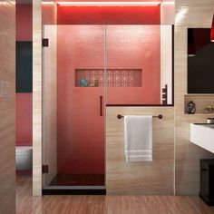 a bathroom with pink walls and wooden floors