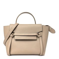 This is an authentic CELINE Grained Calfskin Micro Belt Bag in Light Taupe.This handbag is crafted of grained calfskin leather in beige with a structured and spacious silhouette. This shoulder bag features a leather top handle strap, an optional adjustable shoulder strap, and polished brass clasps. The facing flap opens to a matching suede interior. Formal Beige Epsom Leather Shoulder Bag, Luxury Beige Pebbled Leather Shoulder Bag, Beige Epsom Leather Bag With Gold-tone Hardware, Beige Epsom Leather Shoulder Bag With Detachable Strap, Beige Epsom Leather Shoulder Bag For Travel, Beige Epsom Leather Travel Shoulder Bag, Travel Beige Epsom Leather Shoulder Bag, High-end Beige Calf Leather Bag, Beige Epsom Leather Bag With Detachable Strap