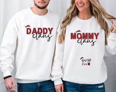 Mama Claus Daddy Claus Couple Christmas Pregnancy Announcement Sweatshirt has a loose fit for a comfortable feel. Super soft cotton and excellent quality print make one to fall in love with it over and over again. Baby Reveal Sweatshirt, Christmas Pregnant Sweatshirt, Baby Announcement Sweatshirts FEATURES (Sweatshirt) - Loose fit - 50% Cotton; 50% Polyester (Fibre content may vary for different colors) - Medium fabric (8.0 Oz/yd² (271.25 g/m - Sewn in label - Runs true to size CARE INSTRUCTIONS Pregnant Sweatshirt, Christmas Pregnancy Announcement, Circuit Ideas, Couple Christmas, Christmas Pregnancy, Baby Announcements, Pregnant Couple, Pregnancy Reveal, Baby Reveal